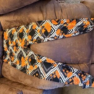 LuLaRoe Orange and Black Patterned Leggings
